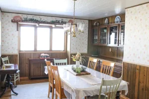 Dining table with cabinets and window