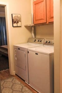 A laundry room with a washer and dryer.