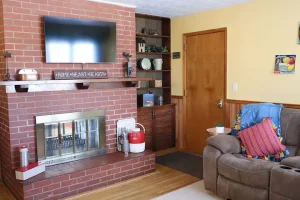 TV Area with cabinets and sofa